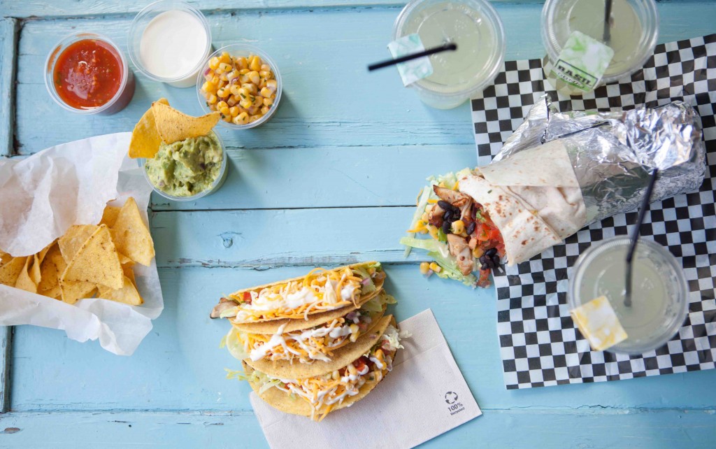 A table of Mexican-style goodness at Donki Rockin' Burrito | Courtesy of Donki