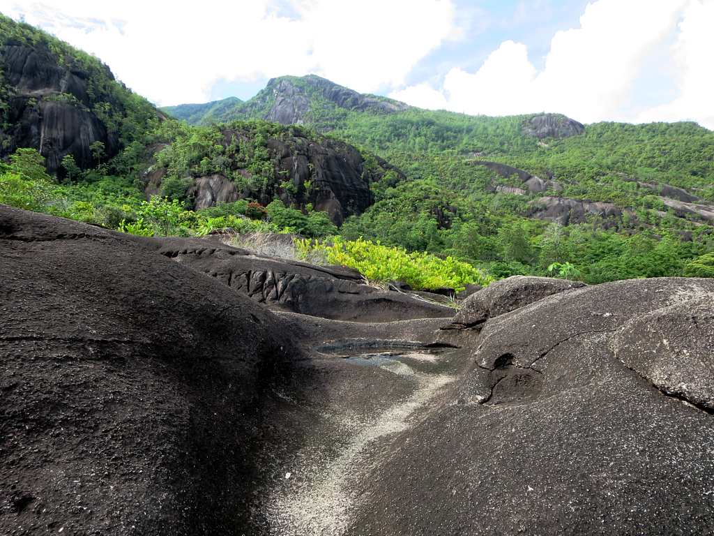 Weathered granite outcrops such as these by the trail to Anse Major on Mahe Island are a characteristic feature of Seychelles. |©david stanley / flickr