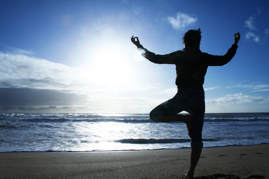 Yoga on the beach | © Mish Sukharev / Flickr