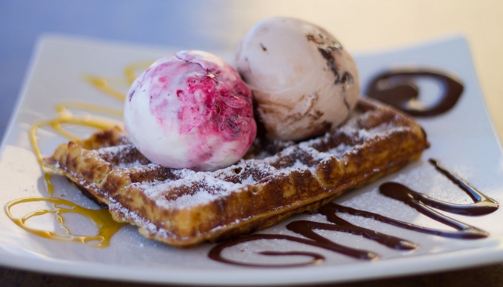 Two scoops of gelato on a delicious waffle at Gelato Mania © Courtesy of Gelato Mania