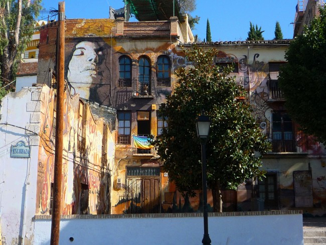 <a href="https://www.flickr.com/photos/gastromartini/" target="_blank" rel="noopener noreferrer">Street art by El Niño in Realejo, Granada | Martin Haisch/Flickr</a>