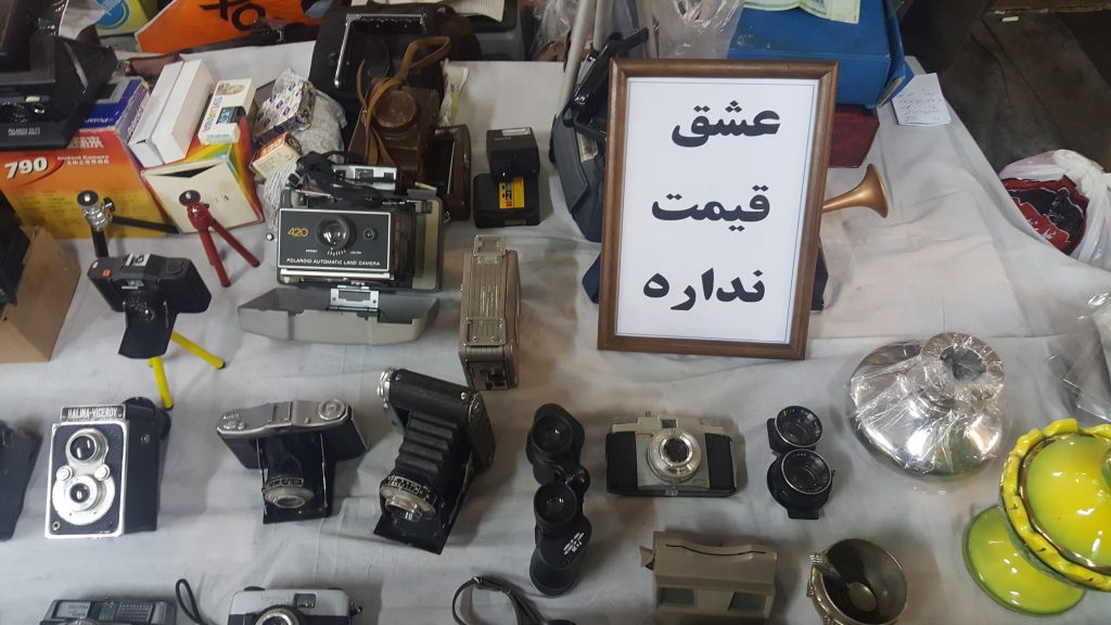 A vintage camera dealer's sign says "You can't put a price on love" | © Pontia Fallahi