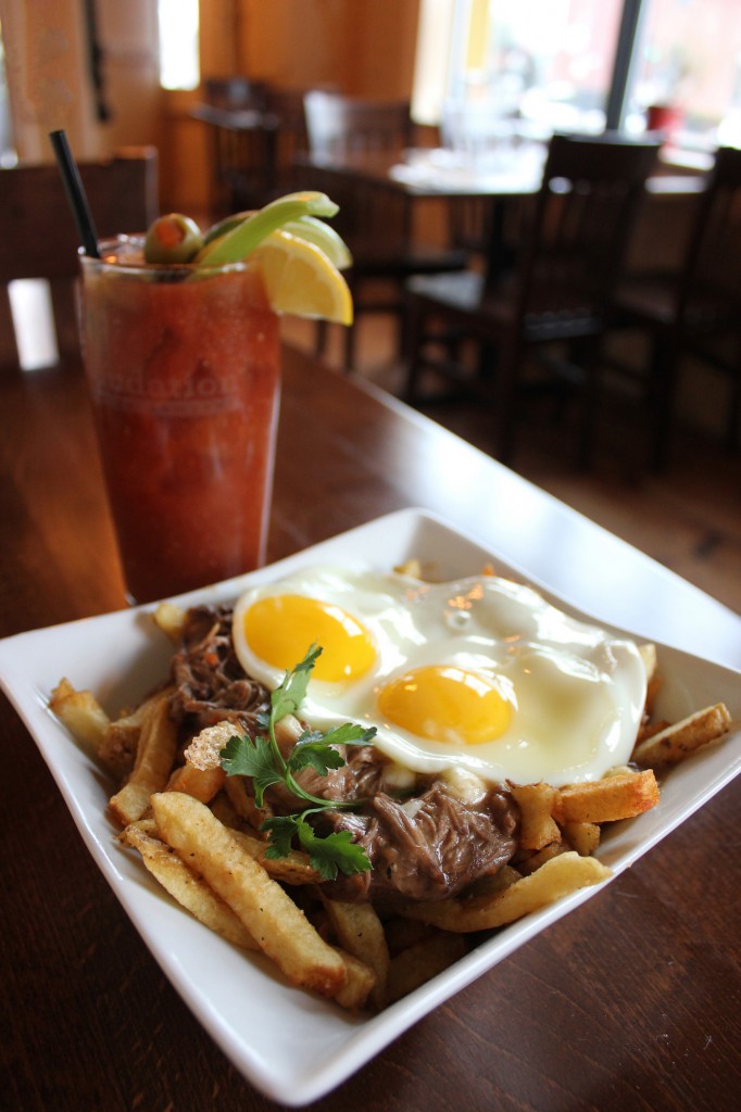 Poutine and Eggs with a Bloody Mary, Courtesy of Little Tap House