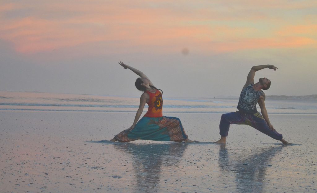 Yoga on the beach © Courtesy of SKA Clothing