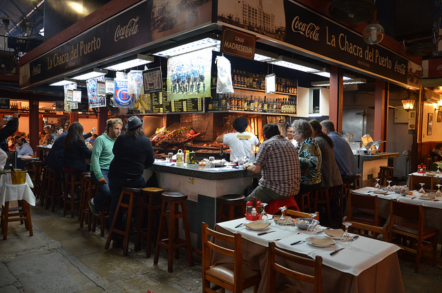 People eating at Mercado del Puerto, Montevideo, Uruguay