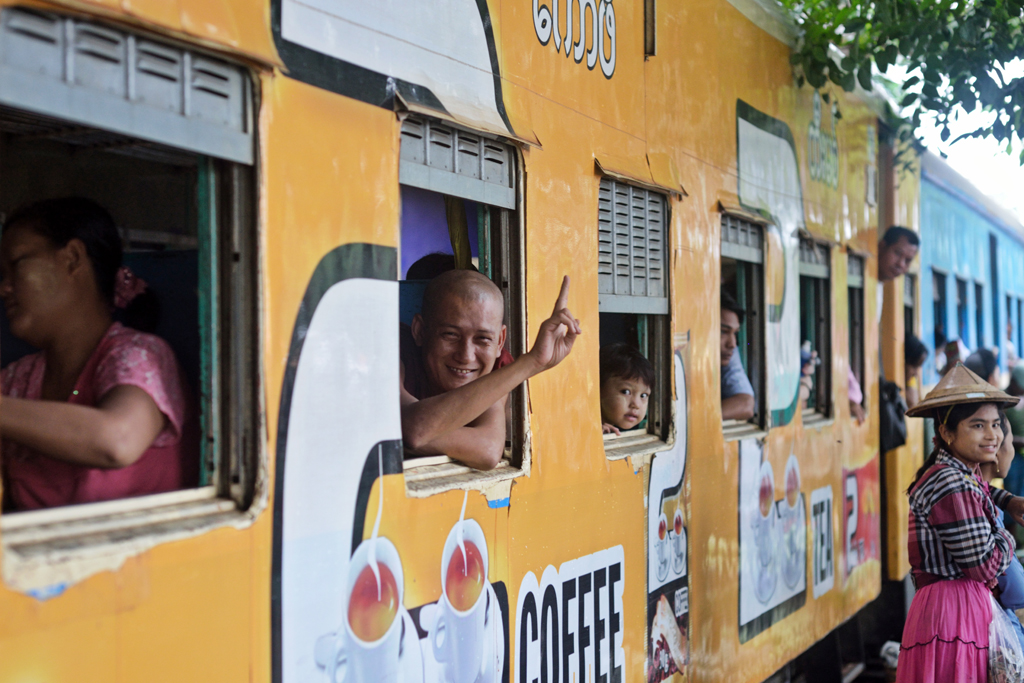 Burmese-Man-Waving-from-Train